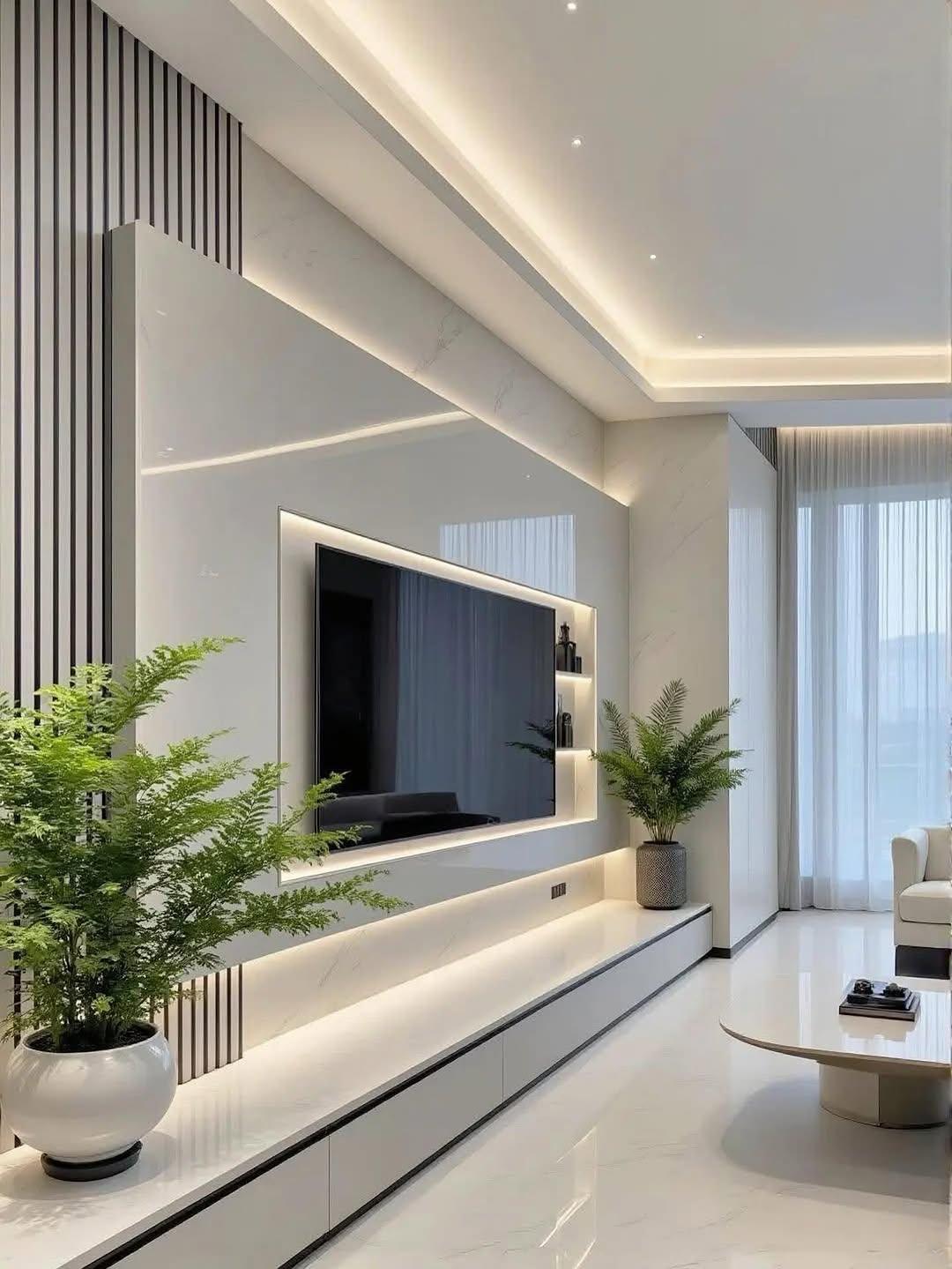 Living room with wall-mounted TV and media storage